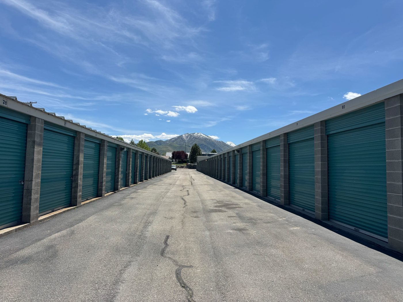 Drive-up storage units at Sunset Storage Centers with the mountains behind